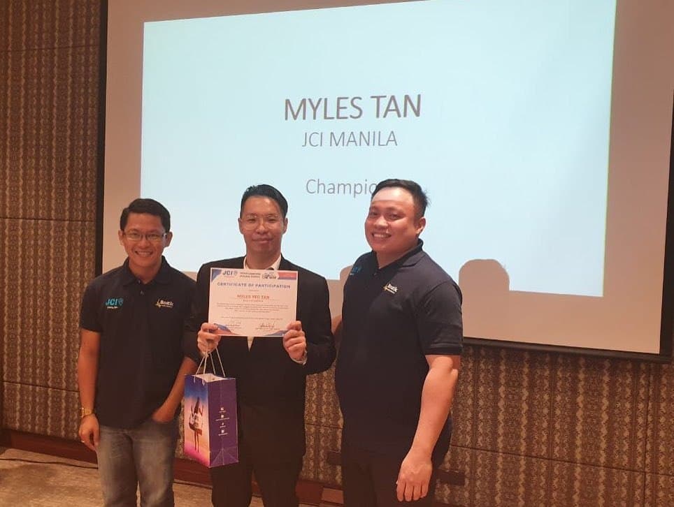 Stage projection showing Myles Tan JCI Manila Champion at the 2019 AreaCon public speaking contest
